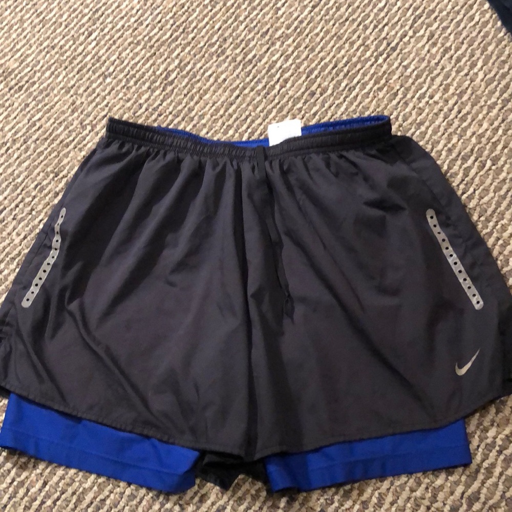 Black Nike running shorts